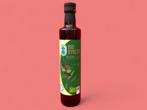 Kyklos Bio-Olivenöl Flasche von Vorne vor rosa Hintergrund
